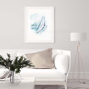 May include: A framed watercolor painting of abstract shapes in shades of blue and white. The painting is titled "kiyomi Sato".