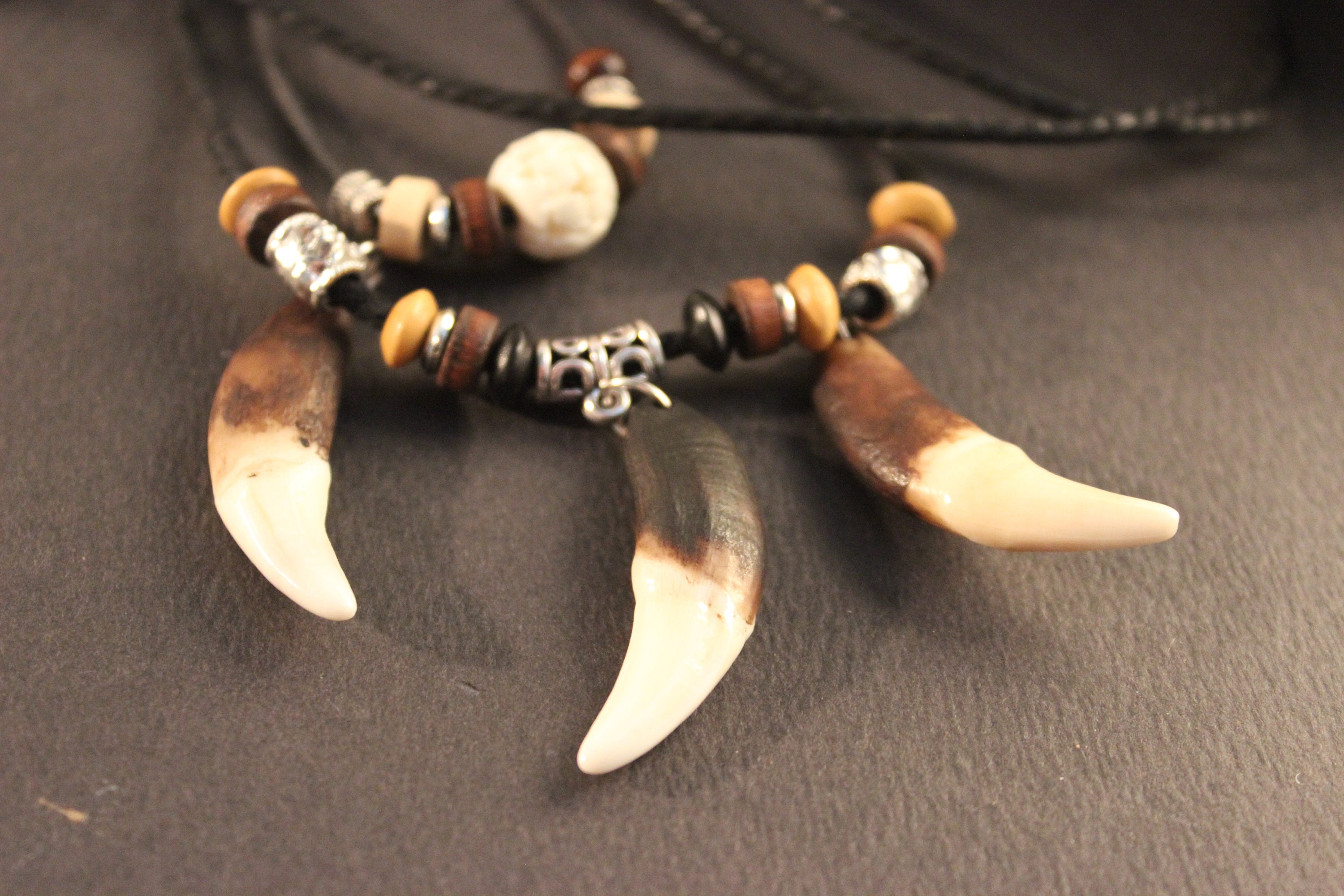 Vintage Hand Carved Yak Bone Wolf Tooth Pendant With Wood Beads And  Adjustable Rope Set Of 12 From Ryananderson, $17.48 | DHgate.Com