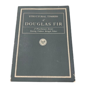 May include: A dark green rectangular booklet titled Structural Timbers of Douglas Fir, A Weyerhaeuser Service Insuring Uniform Strength Values. The cover features a white border and a circular Weyerhaeuser Forest Products logo in the center.
