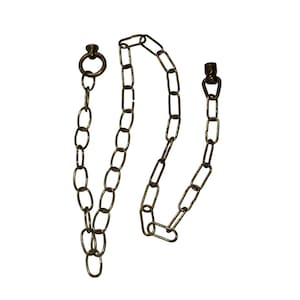 May include: Three sections of brass-colored chain are displayed against a white background. Each chain section has a different length and is composed of oval-shaped links. The chains have a connector at the top and bottom.