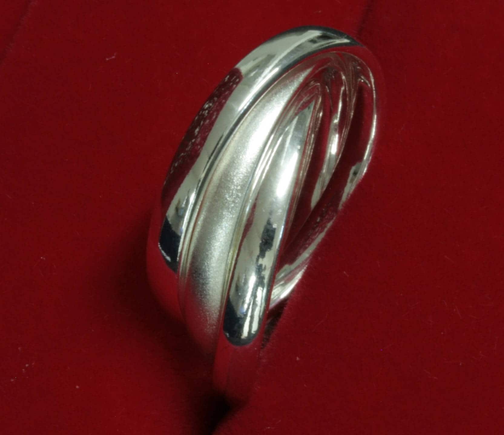 Bague entrelac e 3x3mm style Cartier en argent massif 7 5grs