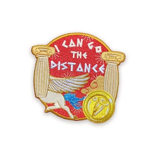 May include: Embroidered patch with a red background and gold trim. The patch features a white winged horse with a blue tail, two gold columns, and the text "I CAN GO THE DISTANCE" in white.