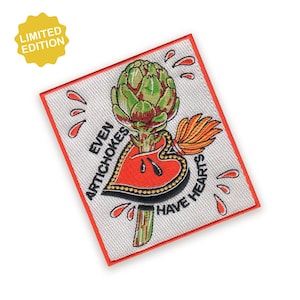 May include: A square patch with a red border features a green artichoke above a red heart with gold accents. The text "EVEN ARTICHOKES HAVE HEARTS" is displayed. Red teardrop shapes surround the design. A yellow "LIMITED EDITION" sticker is in the upper left corner.