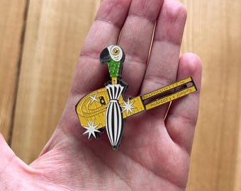 Pin de esmalte interactivo: Diseño práctico inspirado en Poppins