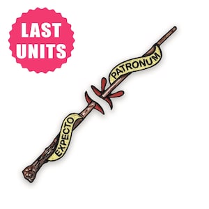 May include: Embroidered patch depicting a wand design with the words "Expecto Patronum" on a yellow banner. The wand is brown with red details. A pink circle with "LAST UNITS" is in the upper left.
