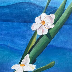 May include: A painting of two white flowers with yellow centers on a green stem against a blue background.