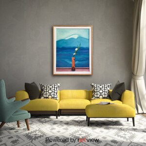 May include: A yellow sectional sofa with a matching ottoman in a living room setting. A framed painting of a mountain landscape with a vase of white flowers is hanging on the wall.