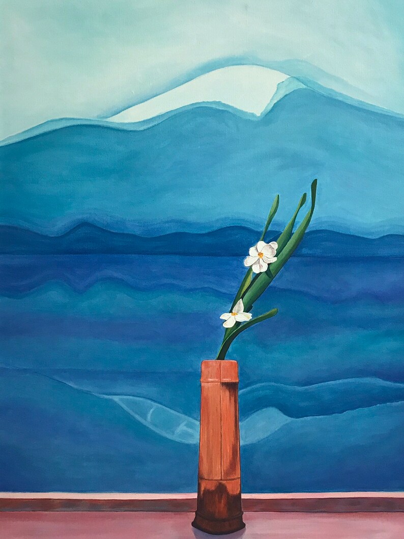 May include: A single white flower with green stems in a brown vase against a blue and white mountain landscape.