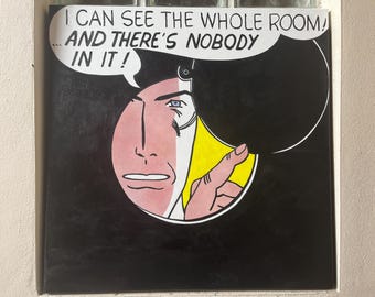 May include: Pop art style print featuring a man's face with a speech bubble. The text reads "I CAN SEE THE WHOLE ROOM! ...AND THERE'S NOBODY IN IT!" The artwork uses bold lines and primary colors.