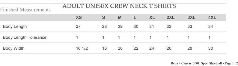 Puede incluir: Un gr&aacute;fico que muestra las medidas finales para camisetas de cuello redondo unisex para adultos en tallas XS a 4XL. El gr&aacute;fico muestra la longitud del cuerpo, la tolerancia de longitud del cuerpo y el ancho del cuerpo en pulgadas.