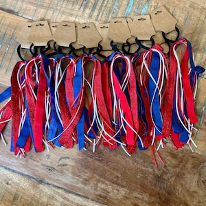 Team gift, 12 + hair bows to match team colors.Customizable Hair Ribbon, includes sport ribbon, team color ribbon, and coordinating ribbon.
