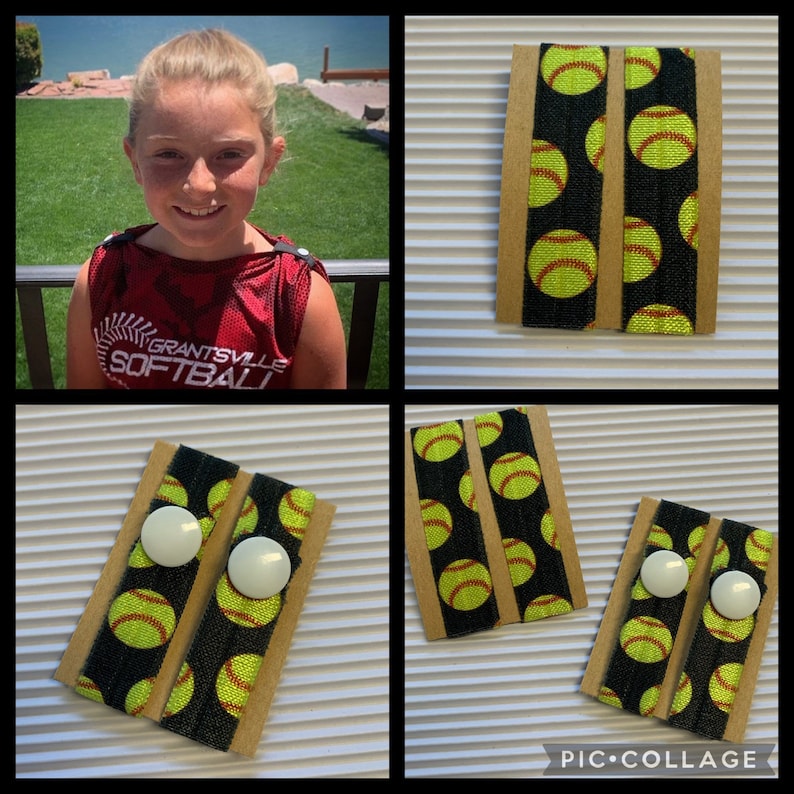 K&ouml;nnte beinhalten: Zwei schwarze Gummib&auml;nder f&uuml;r Haare mit einem gelben Softball-Muster. Die Haargummis befinden sich auf einer braunen Karte mit wei&szlig;en Kn&ouml;pfen.