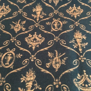 May include: A dark green fabric with a gold pattern of repeating floral designs, urns, and musical instruments. The pattern is intricate and detailed.