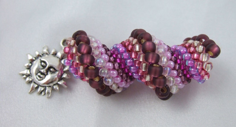 Pink /& Purple Cellini Spiral Dreadlock Bead with Sun Charm