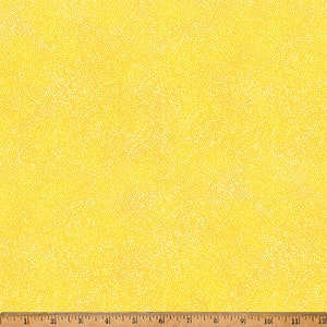 May include: Yellow fabric with a white polka dot pattern. The fabric is a solid yellow color with small white dots scattered throughout.