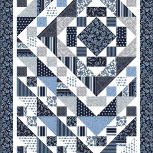May include: A quilt pattern with a geometric design featuring squares and triangles in shades of blue and white. The quilt is made up of different fabrics with various patterns, including floral, polka dot, and striped.