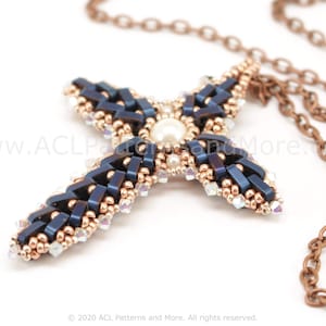May include: A beaded cross pendant necklace with a dark blue and copper colour scheme. The cross is made with small beads and has a pearl in the centre. The necklace is attached to a copper chain.