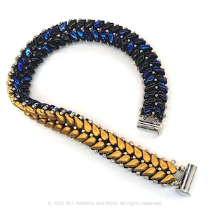 May include: A two-tone beaded bracelet with a black and blue section and a gold section. The bracelet has silver-toned clasps.