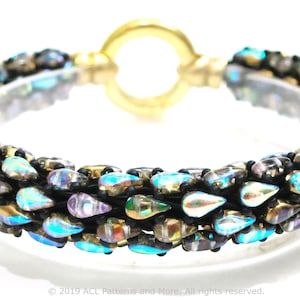 May include: A beaded bracelet with iridescent blue, gold, and black beads. The bracelet is made with a woven pattern and has a gold clasp.