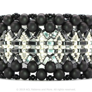 May include: A wide cuff bracelet featuring rows of matte black spherical beads bordering a central band of metallic silver and dark gray rectangular beads arranged in a geometric pattern. The text 2019 ACL Patterns and More. All rights reserved. is visible.