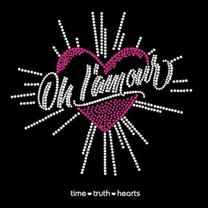 May include: A pink heart with white dots and the text "Oh I'm in love" in white with a white dotted sunburst behind it. The text "time truth hearts" is below the heart.