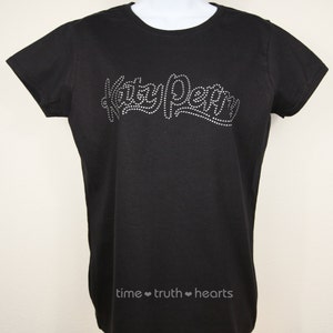 Katy Perry logo (10.25&quot; x 3.5&quot;) in brilliant clear or red rhinestones t-shirt, tank top or hoodie- **free shipping in the U.S.**