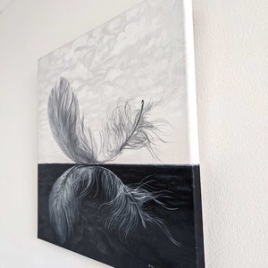 May include: A black and white painting of a feather on a black background with a white sky above. The feather is depicted in a realistic style with detailed brushstrokes. The artist's signature, "T.K. Dumenko 2011", is visible in the lower right corner.
