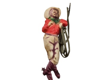 Vintage Celluloid Western Man with Rope Brooch (A9144)