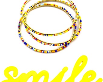 Set of 4 beaded multi color seed bead bangle bracelets