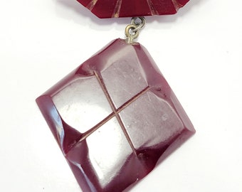 Antique Cherry Bakelite Etched Dangle Brooch