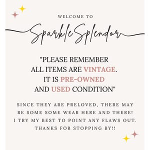 May include: A cream-colored sign with the text "WELCOME TO Sparkle Splendor" in a cursive font. The sign also states that all items are vintage, pre-owned, and in used condition. Decorative stars are in the corners.