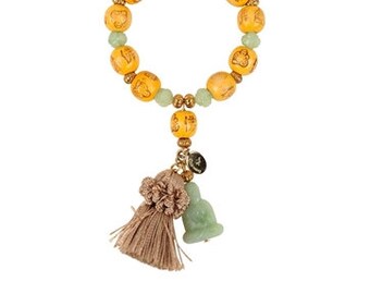 NOS Bee Charming apple jade wood acrylic and fabric tassel bracelet