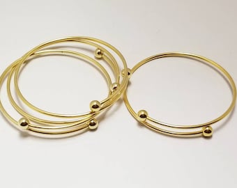 Vintage NOS expandable gold plated bangles set of 4