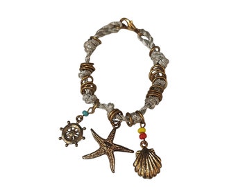 Vintage NOS Unsigned Bee Charming Silk Cord Star Fish Charm Friendship Bracelet