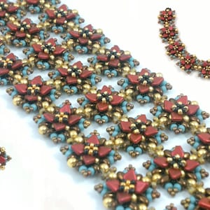 May include: A set of beaded jewelry featuring a bracelet, necklace, and earrings. The jewelry is made with small, colorful beads in shades of red, gold, and blue. The pieces are arranged in a geometric pattern, creating a modern and stylish look.