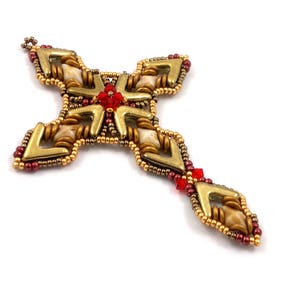 May include: A gold and red beaded cross pendant with a geometric design. The cross is made with small gold beads and red glass beads.
