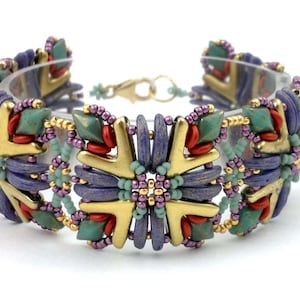 May include: A colorful beaded bracelet with a geometric design. The bracelet features blue, green, gold, and red beads arranged in a starburst pattern.