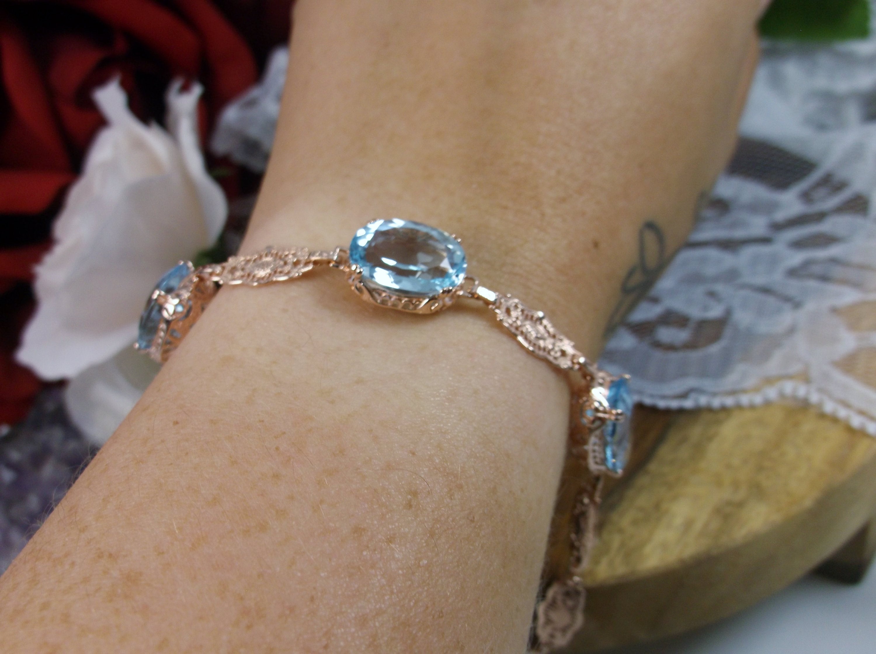 Blue Topaz Bracelet In Gold With Diamonds (4 Ctw)