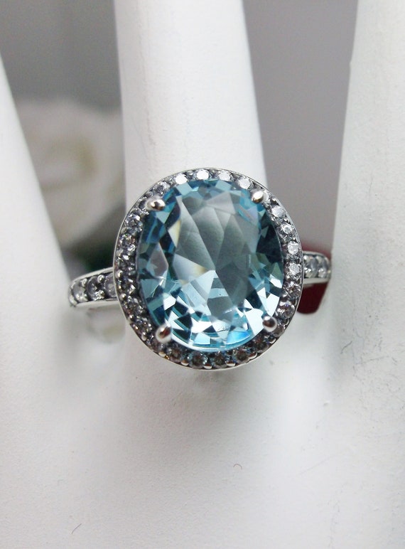 Sterling Silver Oval Sky Blue Topaz And White CZ Ring Sterling Silver Oval Sky Blue Topaz And White CZ Ring