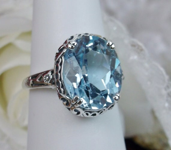 Blue Topaz Oval Faceted Sterling Silver Ring; size 9 1/4