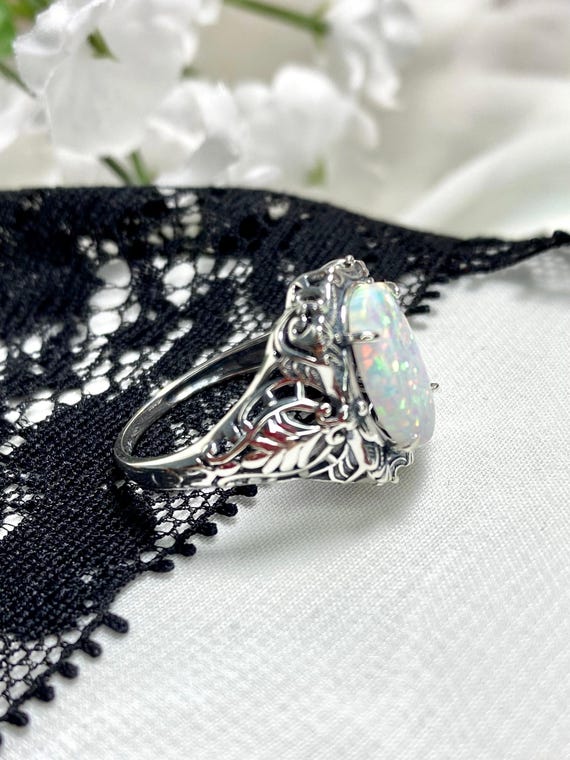 オパールリング White Opal Pt900ホワイトオパール ダイヤモンドリング (NO