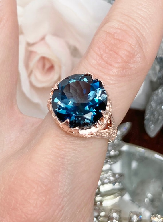 SILVER BLUE TOPAZ ROSE GOLD PLATE RING SILVER BLUE TOPAZ ROSE GOLD PLATE RING