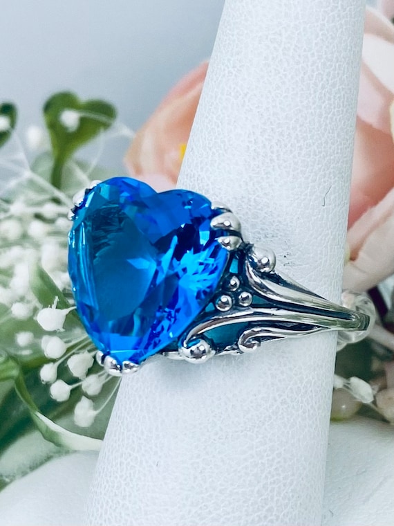 Bague coeur bleu sale