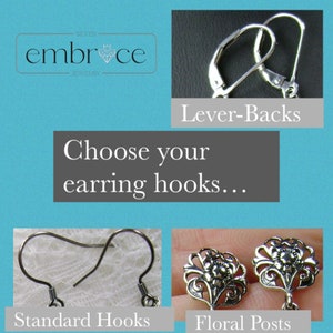 May include: Choose your earring hooks: Lever-Backs, Standard Hooks, or Floral Posts.  The hooks are silver.