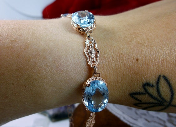 9ct White Gold Blue Topaz Bracelet - Bracelets from Cavendish Jewellers Ltd  UK