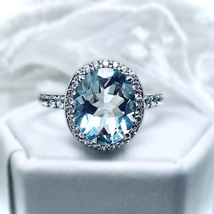 Sterling Silver Oval Sky Blue Topaz And White CZ Ring Sterling Silver Oval Sky Blue Topaz And White CZ Ring
