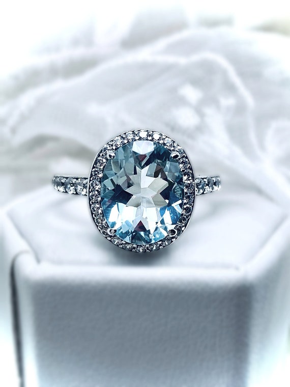 Sterling Silver Oval Sky Blue Topaz And White CZ Ring Sterling Silver Oval Sky Blue Topaz And White CZ Ring