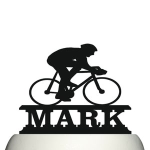 Acrylic bicycle birthday cake topper decoration featuring individual male cyclist.