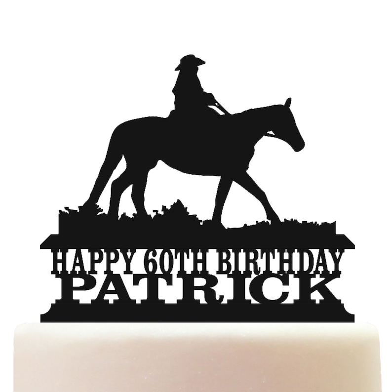 Customised acrylic cowboy on horseback birthday cake topper decoration.