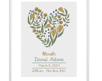 May include: Cross stitch pattern featuring a floral heart with yellow and blue flowers, green leaves, and the text "Noah Daniel Adams, March 6, 2024, 2:05 am, 7lbs. 8oz. 21in".